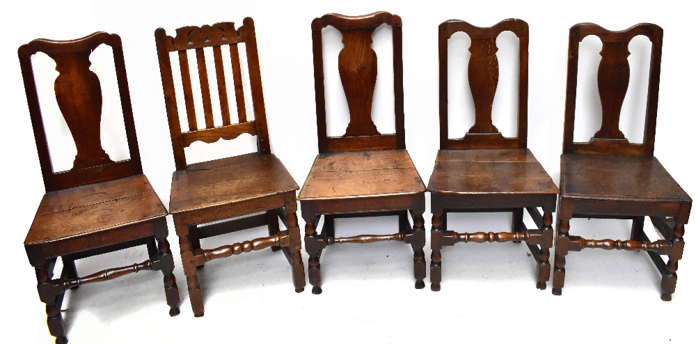 A set of four 19th century oak hall chairs, together with a further 19th century oak splat back hall
