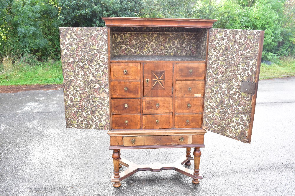 A late 18th century and later German inlaid walnut cabinet on stand, with two doors enclosing a - Bild 2 aus 6