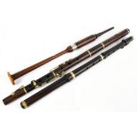 A rosewood chanter, together with two rosewood flutes, one indistinctly stamped (3).