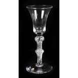 A 19th century wine glass, with bell shaped bowl and twin knopped stem with air twist detailing,