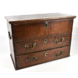 A late 18th century oak chest of small size, the rectangular hinged lid enclosing a