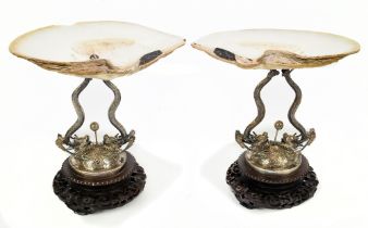 WANG HING; a good pair of late 19th century Chinese silver and mother of pearl tazzas with the shell