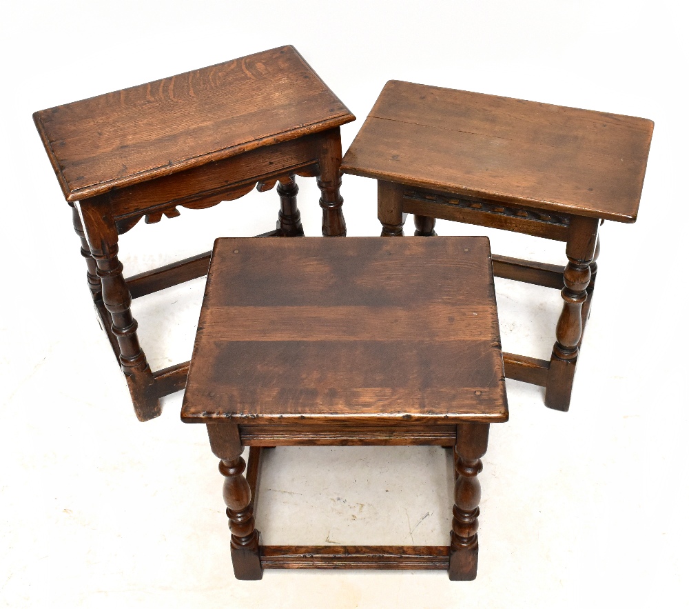 A group of three reproduction oak joint stools, all on block feet, height of largest 49cm.