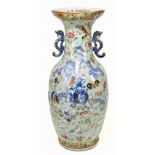 A large Chinese 19th century Canton Famille Rose enamel painted baluster vase with twin pierced