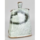 JAMES HAKE (born 1979); a rectangular stoneware bottle covered in nuka and tenmoku glaze,