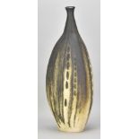 MOLLIE WINTERBURN (1920-1996); a tall triangular stoneware bottle partially covered in iron glaze