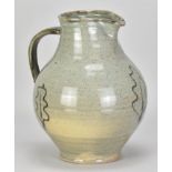 ADRIAN LEWIS-EVANS (1927-2021); a large stoneware bellied jug covered in grey/green glaze with oak