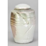 JACK DOHERTY (born 1948); a large porcelain jar and cover covered in soda vapour glaze with copper