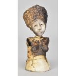 SALLY MACDONELL (born 1971); a smoke fired stoneware figure of an African female, incised signature,