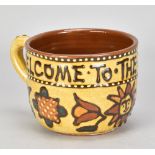 MARY WONDRAUSCH (1923-2016); 'Millennium Cup', a large slipware mug inscribed 'Welcome to the Year