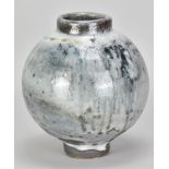 JAMES HAKE (born 1979); a stoneware moon jar covered in carbon trap shino glaze, impressed JH