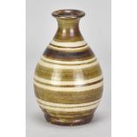 SHINSAKU HAMADA (born 1929); a stoneware sake bottle with bands of iron decoration, height 13.5cm.