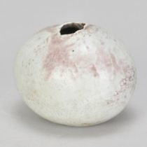 ALAN WALLWORK (1931-2019); a porcelain egg covered in pale grey glaze with pinkish hues, incised