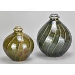 NICK REES (born 1949) for Muchelney Pottery; a bulbous faceted stoneware bottle covered in tenmoku