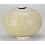 ABDO NAGI (1941-2001); a large globular stoneware vessel covered in streaky pale green glaze,