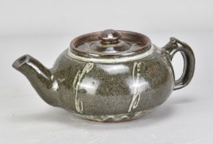 Abuja Pottery; a stoneware teapot with wax resist decoration, height 9.5cm.Additional