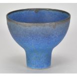 ABDO NAGI (1941-2001); a stoneware pedestal bowl covered in mottled blue/turquoise glaze with bronze