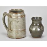 PETER DICK (1936-2012) for Abuja Pottery; a stoneware mug, impressed PBD and pottery marks, made