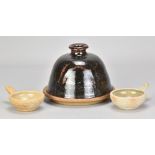 MARTHA ALLEN (born 1952); a stoneware cheese dome and plate covered in tenmoku breakling to kaki