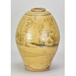 PHIL ROGERS (1951-2020); a stoneware bottle covered in green ash glaze with incised decoration,