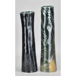 JOANNA HOWELLS (born 1960); a pair of tall cylindrical porcelain vases covered in metallic blue