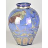 JONATHAN CHISWELL JONES (born 1944); a porcelain lustre ware vase covered in copper/cobalt