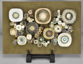 ANNE PLANT (1934-2019); 'Thalia', a stoneware wall hanging bolted on hessian covered board,