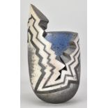 PAUL MUCHAN (born 1948); a raku vessel of eccentric form with zig-zag decoration, impressed PM