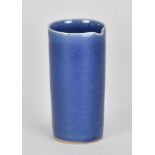 RUPERT SPIRA (born 1960); a small stoneware pouring vessel covered in blue glaze, impressed RS mark,