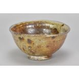 NIC COLLINS (born 1958); a wood fired stoneware bowl, incised signature, diameter 14cm. (D)