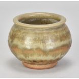 KATHARINE PLEYDELL-BOUVERIE(1895-1985); a small stoneware pot covered in green ash and iron glaze,