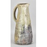 NIC COLLINS (born 1958); a tall wood fired stoneware pitcher with incised decoration, incised