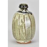 MIKE DODD (born 1943); a stoneware cut sided bottle covered in high silica ash glaze with tenmoku