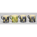 KEVIN DE CHOISY (1954-2020); a set of four small earthenware mugs covered in Whieldon type glazes,