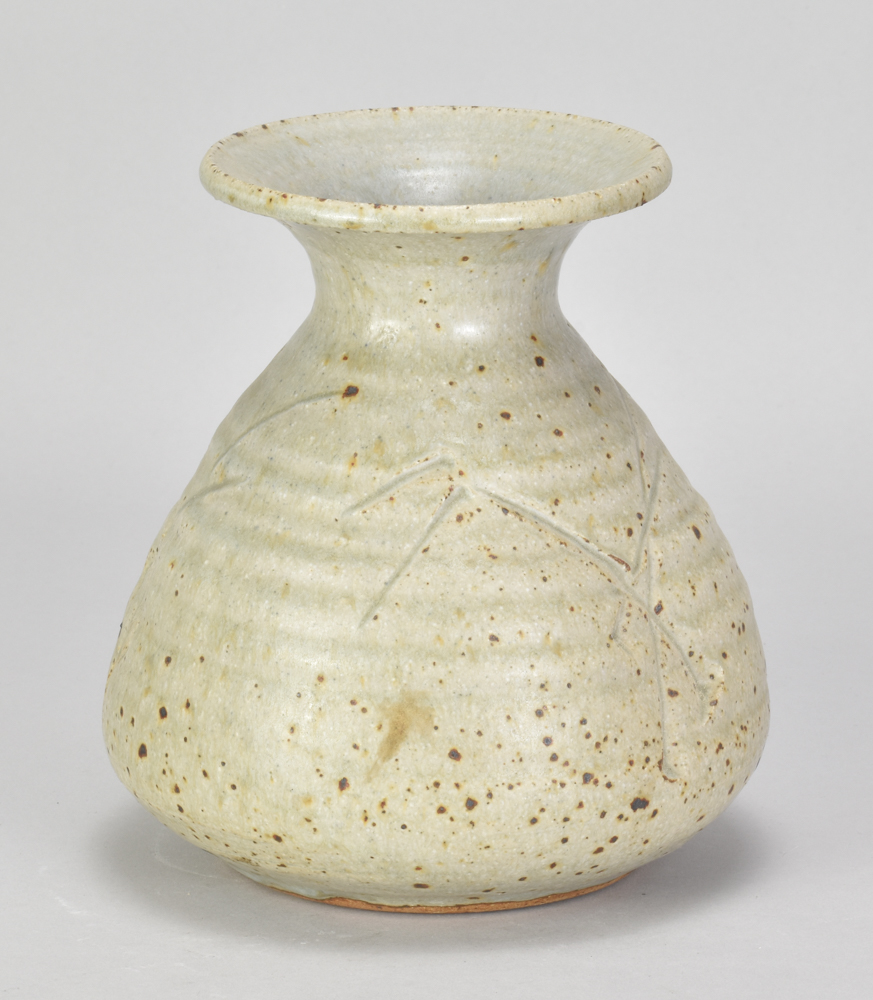 ADRIAN LEWIS-EVANS (1927-2021); a stoneware bottle covered in green ash glaze with incised