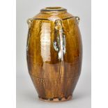 PHIL ROGERS (1951-2020); a lugged stoneware bottle covered in treacle glaze with nuka pours and