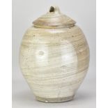 PHIL ROGERS (1951-2020); a large salt glazed jar and cover covered in hakeme slip with impressed