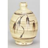 JIM MALONE (born 1946); a stoneware bottle covered in hakeme slip with iron decoration and