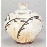 MARK GRIFFITHS (born 1956); a globular stoneware vase covered in shino glaze over iron slip with wax