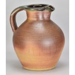 JOHN LEACH (1939-2021) for Muchelney Pottery; a large stoneware bellied jug with toasted unglazed