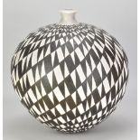 ILONA SULIKOVA (born 1949); a raku vessel decorated with a black and white geometric pattern, height