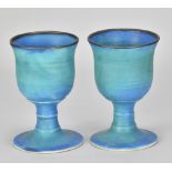 ABDO NAGI (1941-2001); a pair of stoneware goblets covered in copper barium glaze with bronze