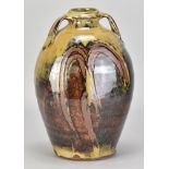 MIKE DODD (born 1943); a twin handled bottle covered in river iron over granite glaze with finger