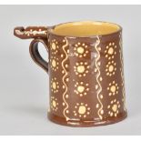 JOHN HUDSON (born 1946); a slipware whistling mug, impressed H mark, height 11.5cm. (D)Additional