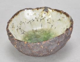 AKIKO HIRAI (born 1970); a miniature stoneware pond bowl with lime green glaze pooling to the