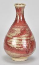 ADRIAN LEWIS-EVANS (1927-2021); a stoneware bottle partially covered in copper red glaze,