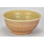 MICKI SCHLOESSINGK (born 1949); a salt glazed bowl with green ash glaze interior, impressed M