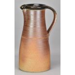 JOHN LEACH (1939-2021) for Muchelney Pottery; a very large stoneware pitcher with toasted unglazed