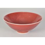 RUPERT SPIRA (born 1960); a stoneware bowl covered in red glaze, impressed RS mark, diameter 16.5cm.