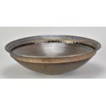 ABDO NAGI (1941-2001); a large porcelain bowl covered in metallic bronze glaze, impressed mark, made